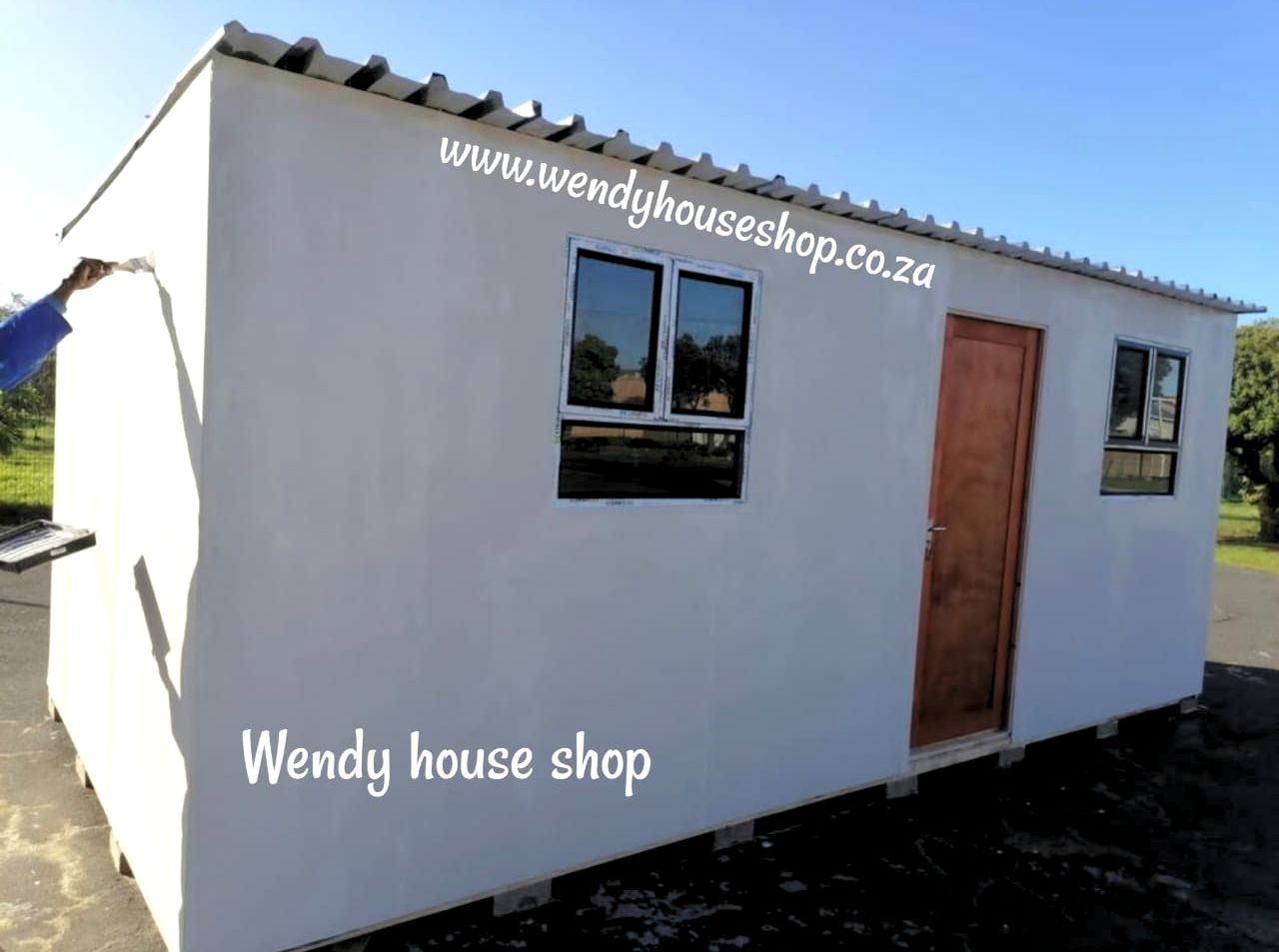flat panelled nutec wendy house painted white